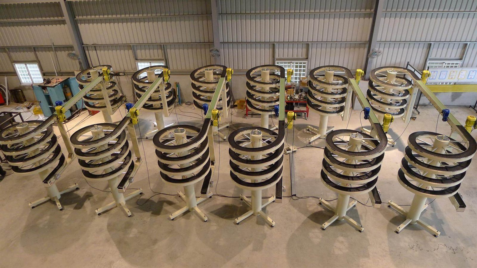 A narrow track spiral conveyor on the NEXUS factory floor.